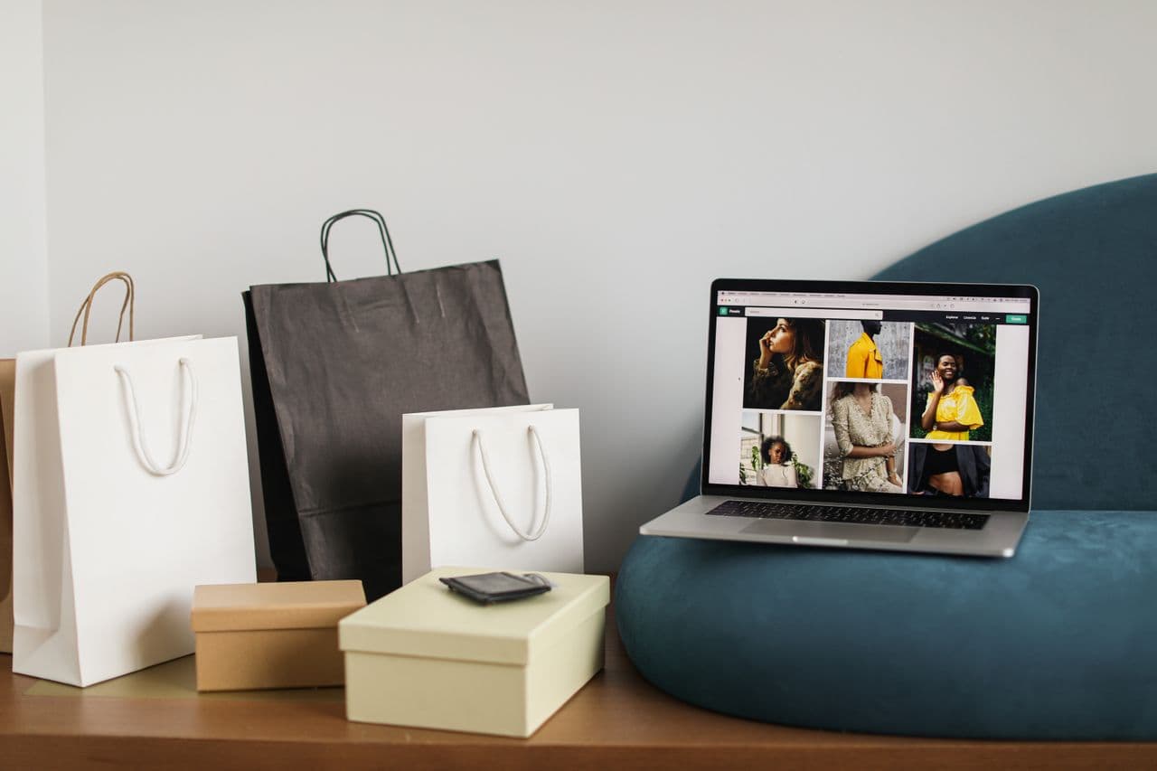 Laptop screen showcasing a fashion e-commerce storefront